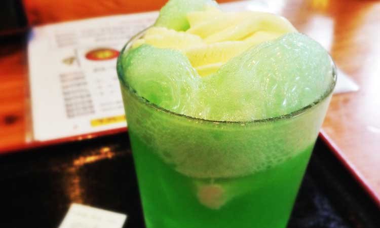 Japanese Melon Cream Soda, green drink with vanilla ice cream in the middle